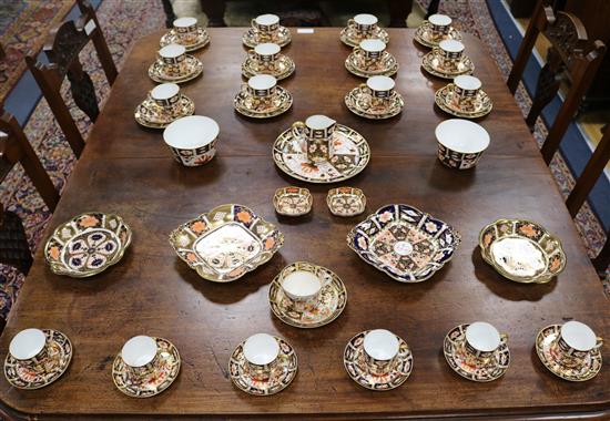 A Crown Derby Imari pattern tea service (40) and 12 coffee set, 4 dishes, 2 small dishes and a cup and saucers